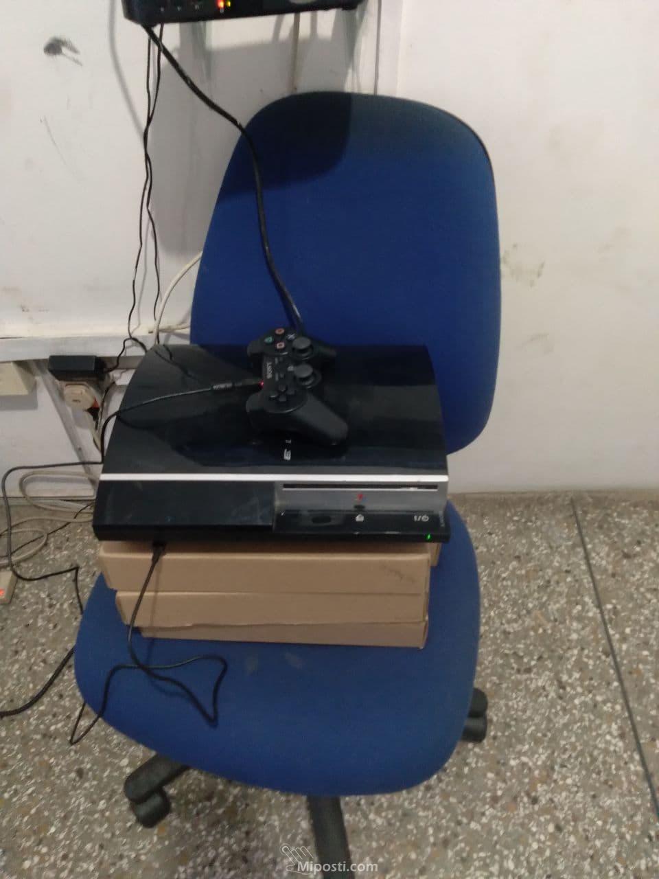 PS3 Gaming Console + 2 Pads + 5 Games